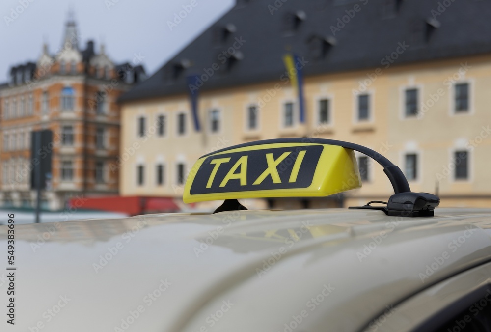 Obraz premium Taxi Berlin parked along the road