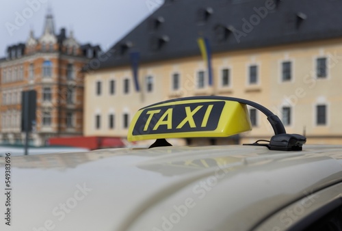 Taxi Berlin parked along the road