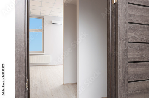 Empty office room with white walls and door. Interior design