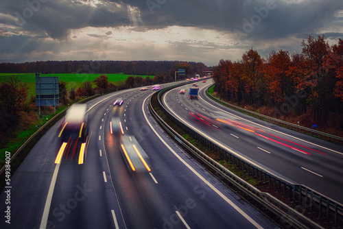 Langzeitbelichtung - Autobahn - Strasse - Traffic - Travel - Background - Line - Ecology - Highway - Night Traffic - Long Exposure - Cars Speeding - Lights - Sunset - High quality photo © Enrico Obergefäll