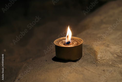 trench military candle burns in the dark. made by Ukrainian volunteers for soldiers serving on the front lines. photo