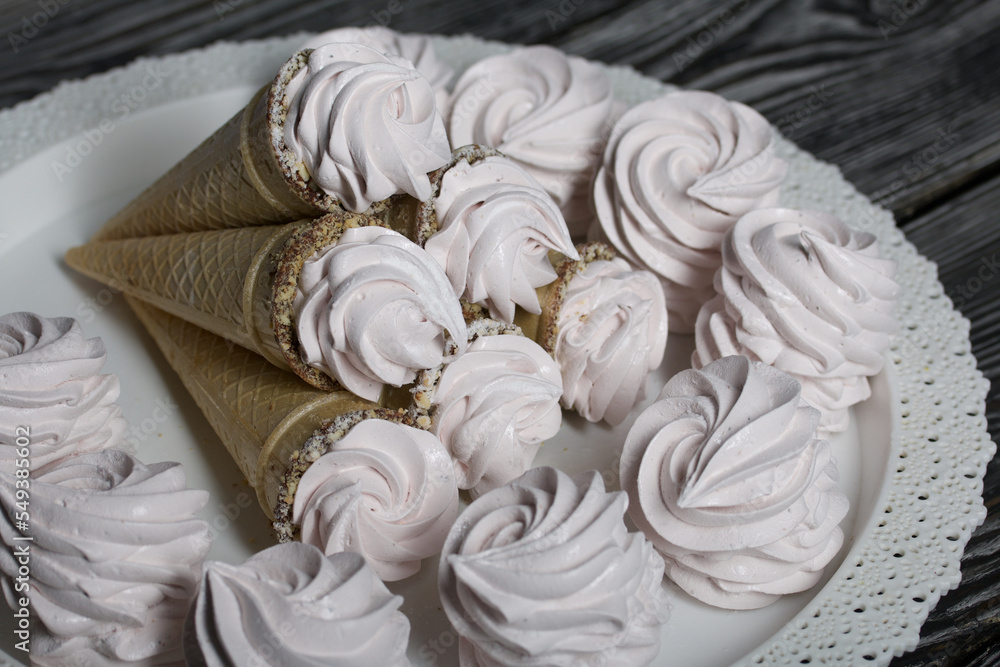 Homemade marshmallows in waffle cones. Homemade zephyr. Homemade marshmallows in waffle cones. Homemade zephyr.