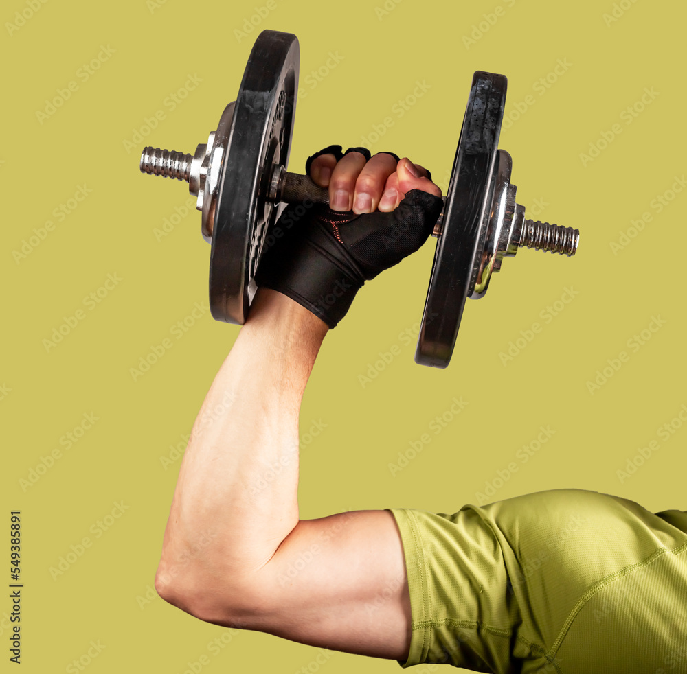 Men arm hand lifting dumb bell close up. Weights, dumbell. High quality photo Men arm hand lifting dumb bell close up. Weights, dumbell. High quality photo