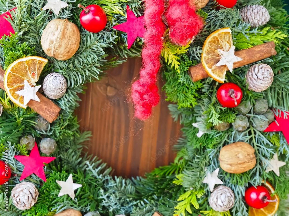 Advent or Christmas arrangement with decoration from nature apples nuts Advent or Christmas arrangement with decoration from nature apples nuts