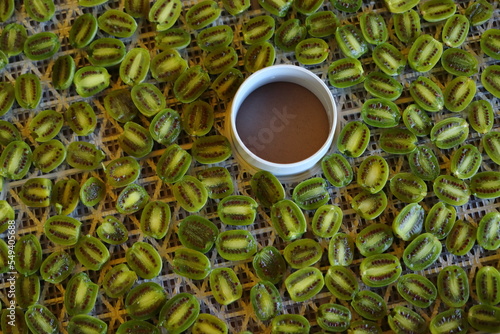 Actinidia Arguta, drying minikiwi fruits in a dryer photo