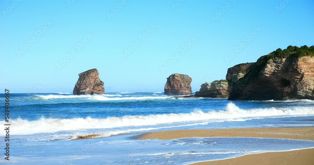 Landscape of Hendaye beach with its famous twin rocks Landscape of Hendaye beach with its famous twin rocks