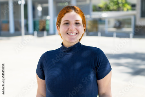 Fényképezés Beautiful corpulent young adult woman with red hair