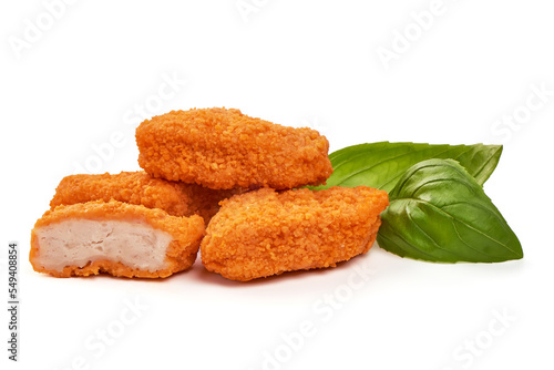 Chicken nuggets with basil, isolated on white isolated background.