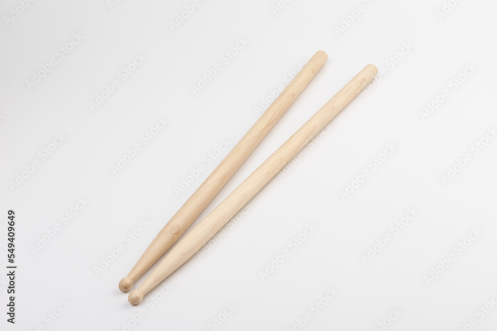 Wooden drumsticks isolated on white background. musical instrument. Wooden drumsticks isolated on white background. musical instrument.