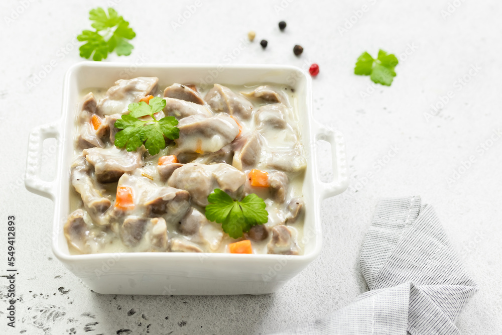 Slow cooker stewed vegetable chicken gizzards, giblets, offal. Top view