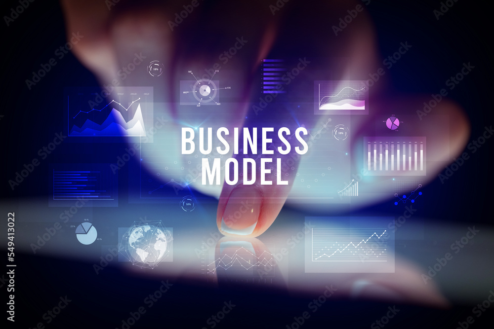 Finger touching tablet with business graphs and icons concept Finger touching tablet with business graphs and icons concept
