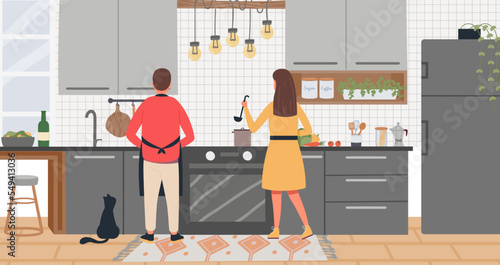 Family cooking at home. Man and woman making soup in kitchen interior. Couple preparing food together