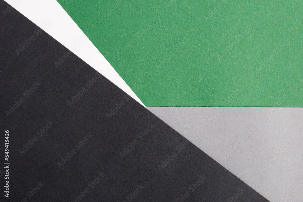 Fototapeta premium Black, white, gray and green divided abstract background