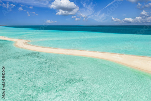 Relaxing aerial beach panorama summer vacation holiday panoramic banner. Waves surf with amazing blue ocean lagoon, sea shore, coastline. Perfect aerial drone top view. Beautiful bright beach, seaside