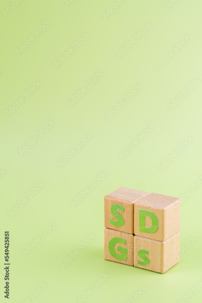 Obraz premium SDGs - sustainable development goals word concept on cubes