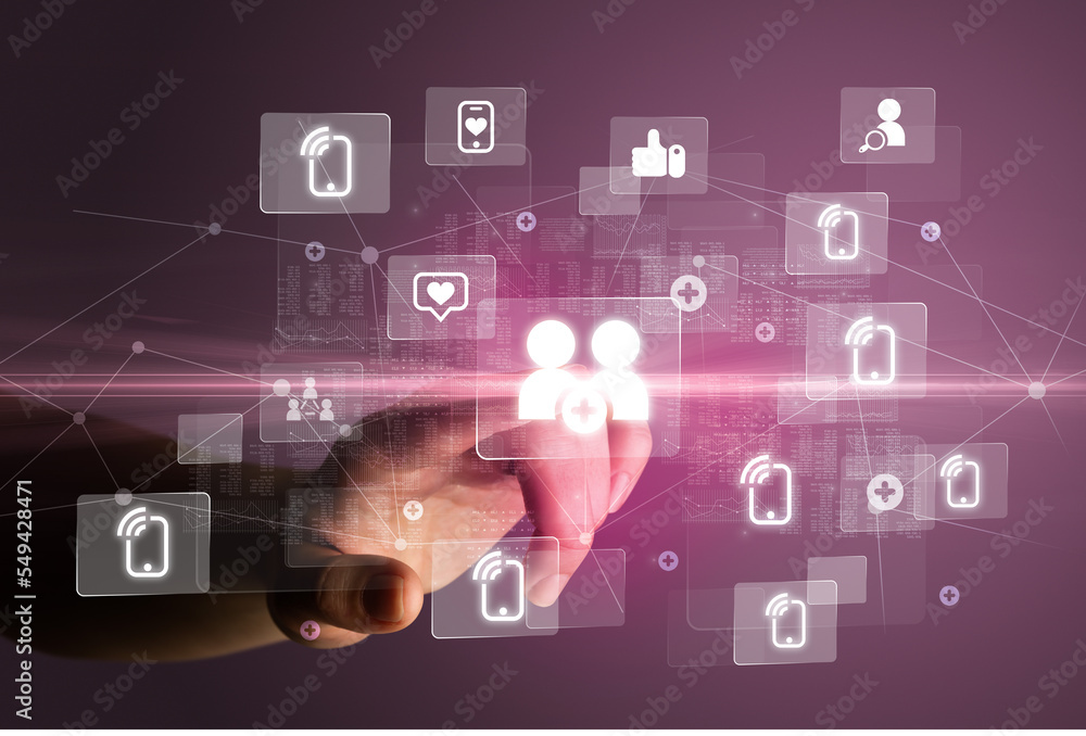 Hand pressing social media multimedia application screen with media icons on futuristic concept Hand pressing social media multimedia application screen with media icons on futuristic concept