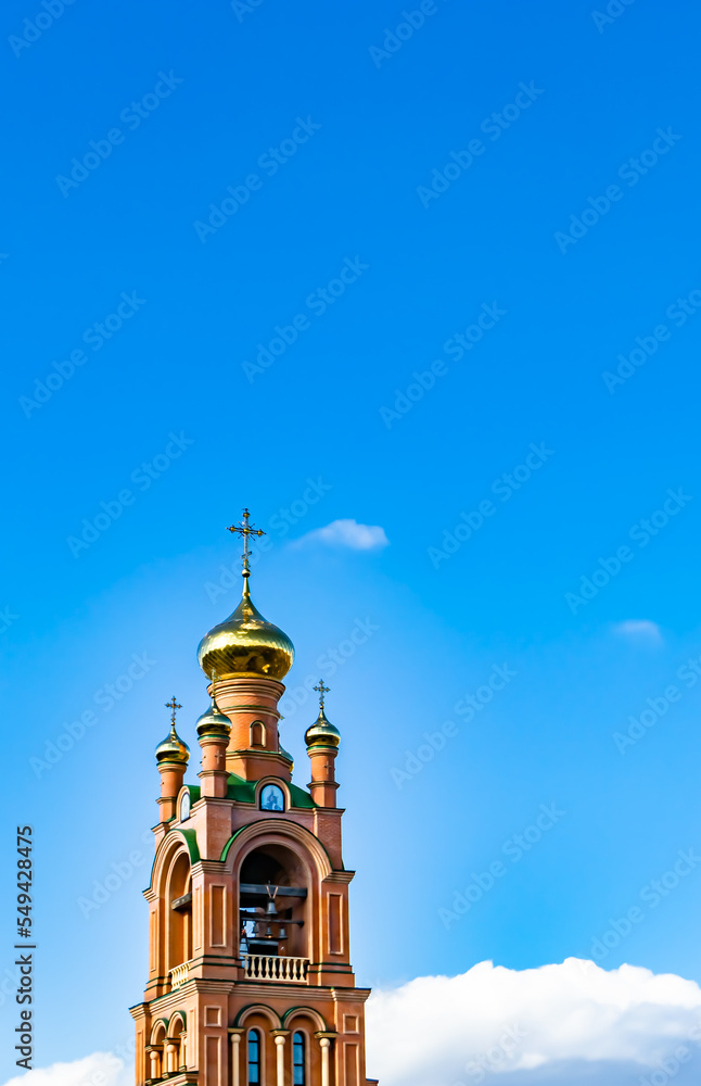 Obraz premium Christian church cross in high steeple tower for prayer