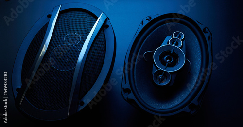 Black car sound speakers close-up on a black background, audio system, hard bass subwoofer