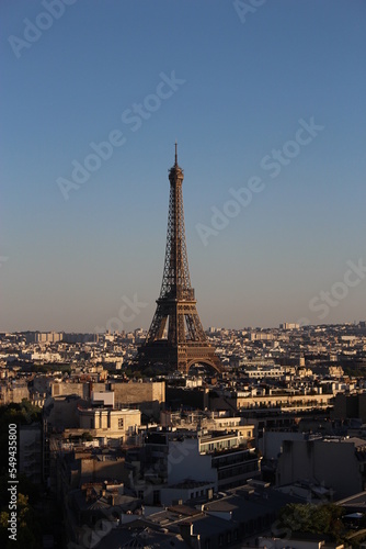 eiffel tower at sunset with cloudless sky © Aldercy Carling