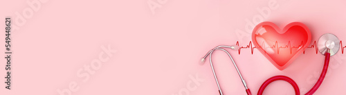 3d Red heart shape with line of cardio gram and stethoscope on pink background, banner and background for heart health, health care, health checkup concept