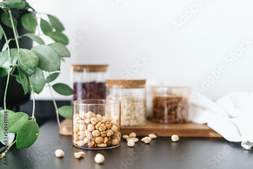 chickpeas in glass food container on countertop at kitchen photo