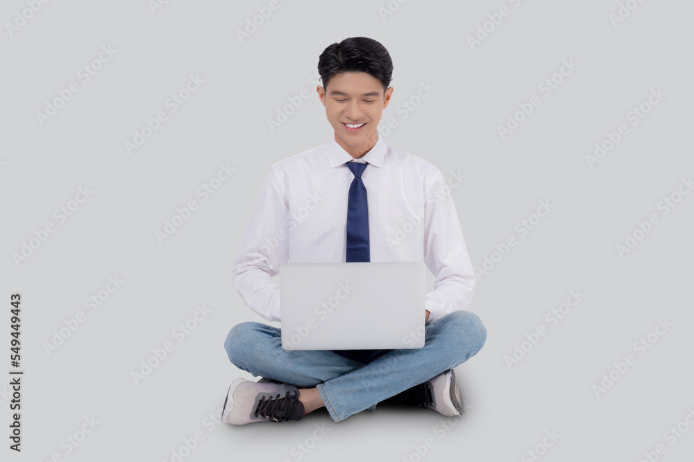 Young asian business man sitting work on laptop computer to internet online isolated on white background, businessman confident and notebook, freelance with success, marketing and communication. Young asian business man sitting work on laptop computer to internet online isolated on white background, businessman confident and notebook, freelance with success, marketing and communication.