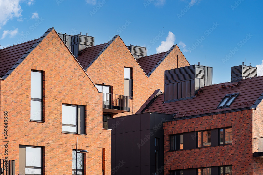 Different condominium houses with brick modern architecture Different condominium houses with brick modern architecture