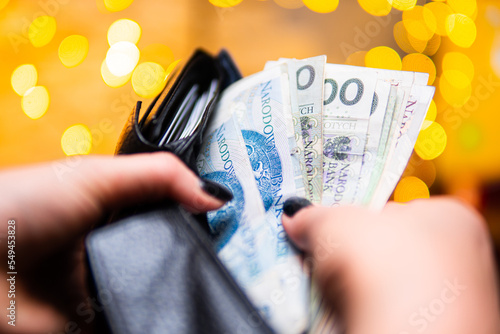 Принти на полотні Close up of a wallet filled with Polish money.