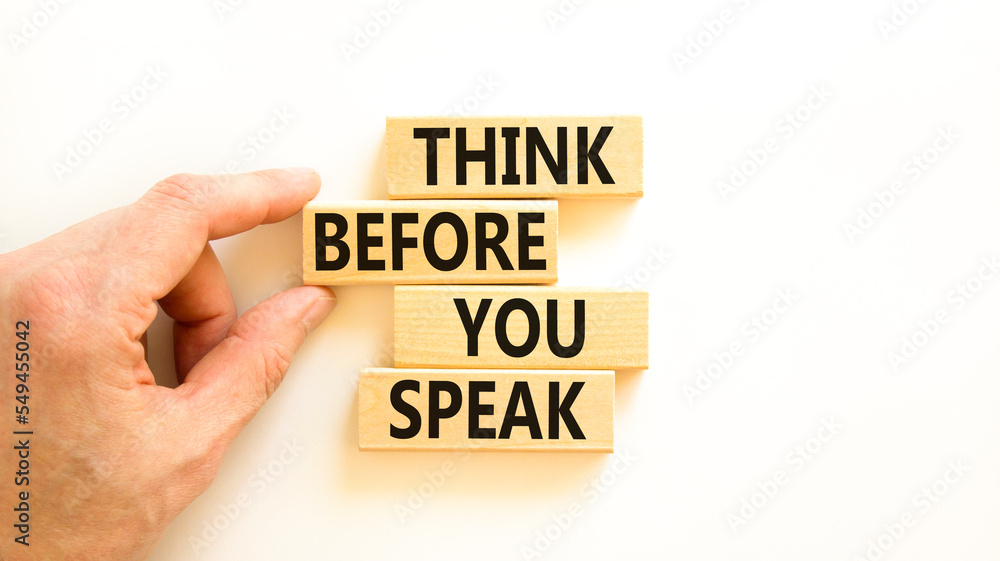 Think before you speak symbol. Concept words Think before you speak on wooden cubes. Beautiful white table white background. Businessman hand. Business think before you speak concept. Copy space. Think before you speak symbol. Concept words Think before you speak on wooden cubes. Beautiful white table white background. Businessman hand. Business think before you speak concept. Copy space.