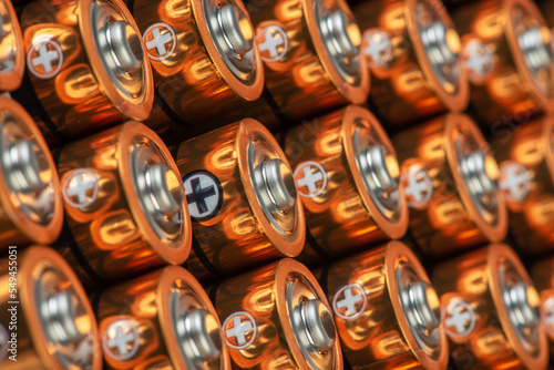 Row of alkaline battery size AA in perspective closeup view photo