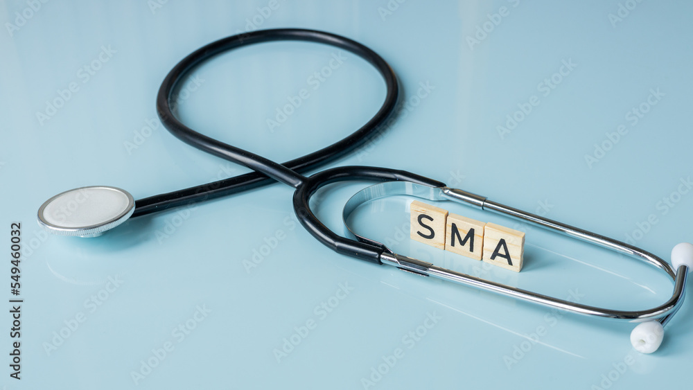 SMA, spinal muscular atrophy, Written on wooden blocks, a rare disease ...
