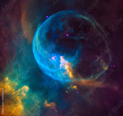Massive star creates a bubble blown into outer space also known as the Bubble Nebula. Digitally enhanced. Elements of this image furnished by NASA.