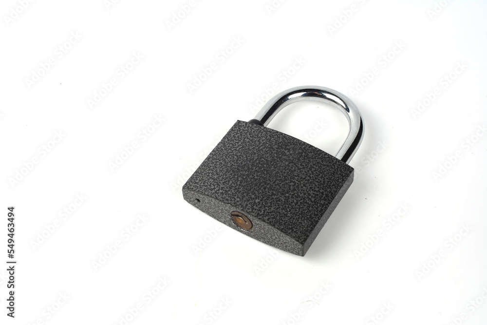Close-Up Of Padlock On White Background . Close-Up Of Padlock On White Background .