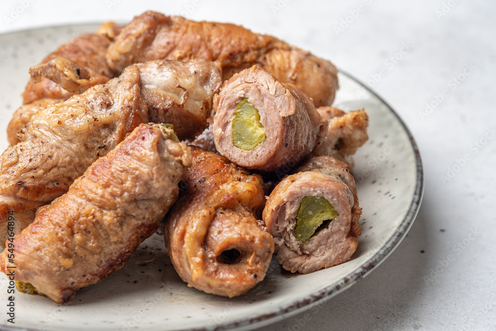 Meat rolls stuffed with mustard and pickled cucumber braised in gravy