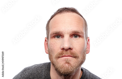 Portrait of a man with a beard on a white background.