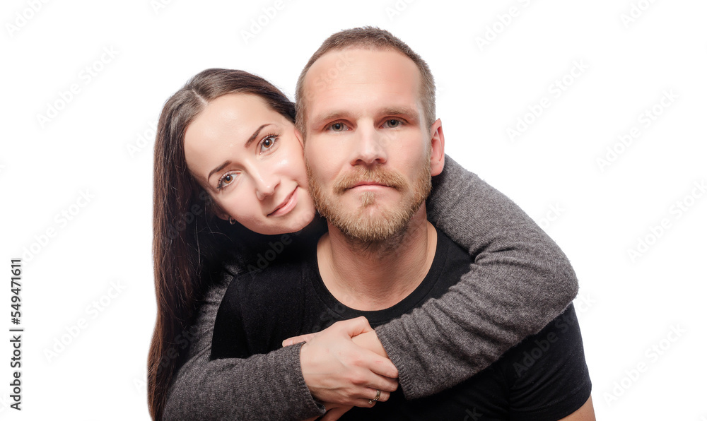 Happy hugging couple in love. Couple on a white background.