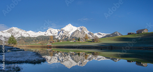 Säntis bereits Schneebedeckt, das Toggenburger Tal noch Schneefrei im Vordergrund der Schwendiesee  photo