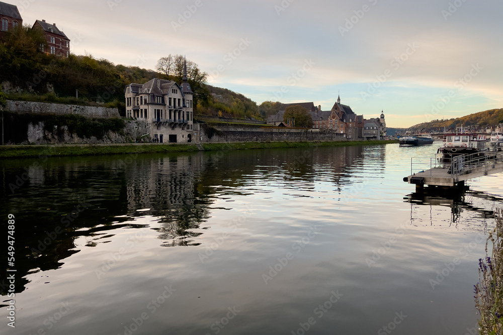 A large barge sailing on the Meuse River in Belgium 