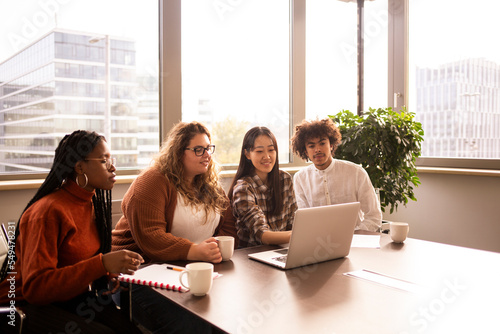 Group of young people working together in the office