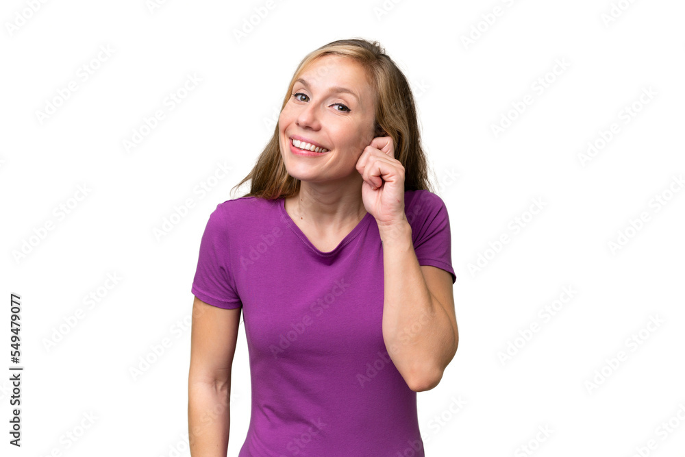 Young blonde woman over isolated background laughing Young blonde woman over isolated background laughing