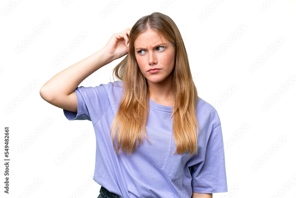 Young beautiful woman over isolated background having doubts while scratching head Young beautiful woman over isolated background having doubts while scratching head