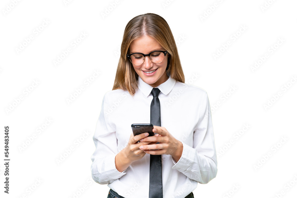 Young business caucasian woman over isolated background sending a message with the mobile Young business caucasian woman over isolated background sending a message with the mobile