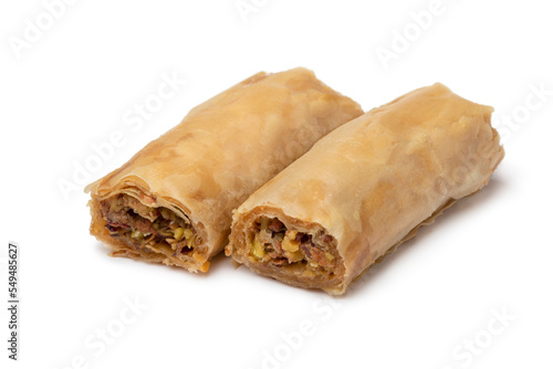 Foto Traditional Syrian cookies stuffed with nuts isolated on white background