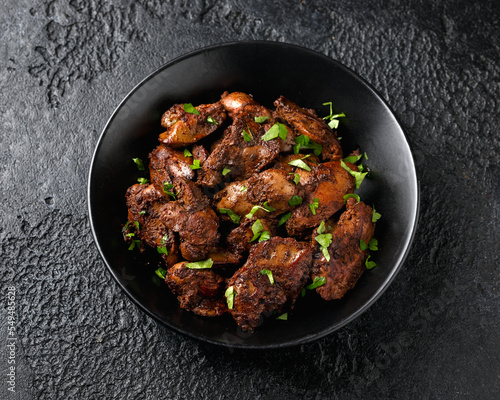 Konstfotografi Fried chicken liver, poultry meat food with herbs