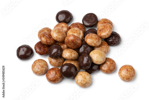 Heap of traditional Dutch kruidnoten, cookies covered with chocolate and coffee glaze isolated on white background