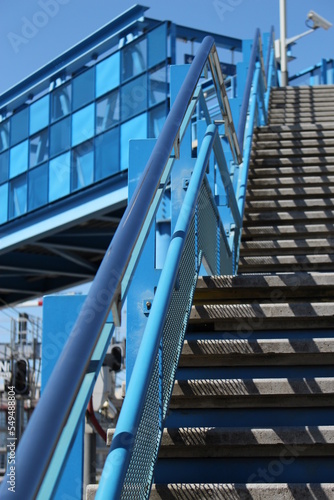 stairs to heaven. Concrete stairs with blue handrail (Paris, France). Concept for growth mindset