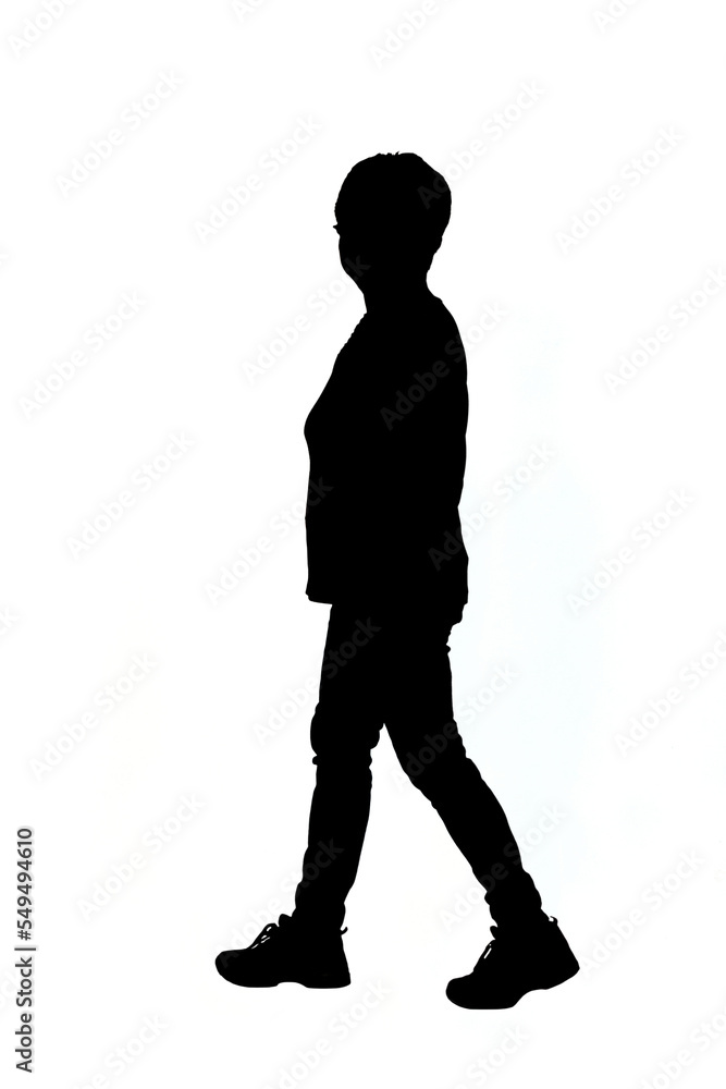 silhouette of a  senior woman looking at camera and walking  on white background