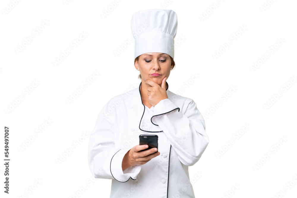 Middle-aged chef woman over isolated background thinking and sending a message Middle-aged chef woman over isolated background thinking and sending a message