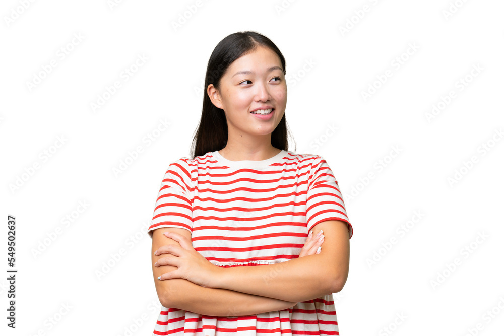Young Asian woman over isolated background with fingers crossing Young Asian woman over isolated background with fingers crossing