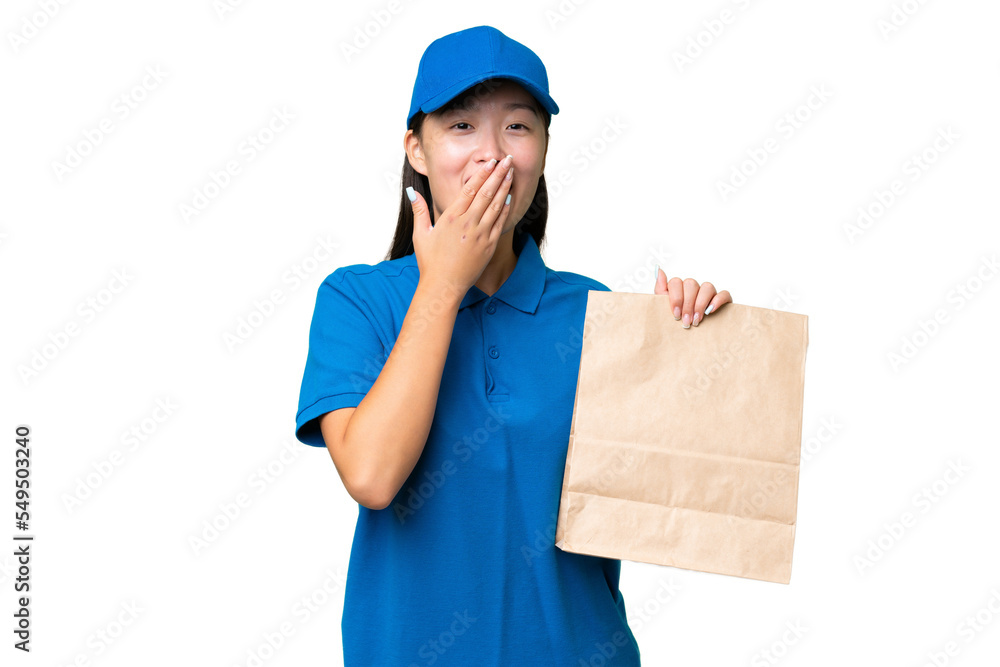 Young Asian woman taking a bag of takeaway food over isolated background happy and smiling covering mouth with hand Young Asian woman taking a bag of takeaway food over isolated background happy and smiling covering mouth with hand